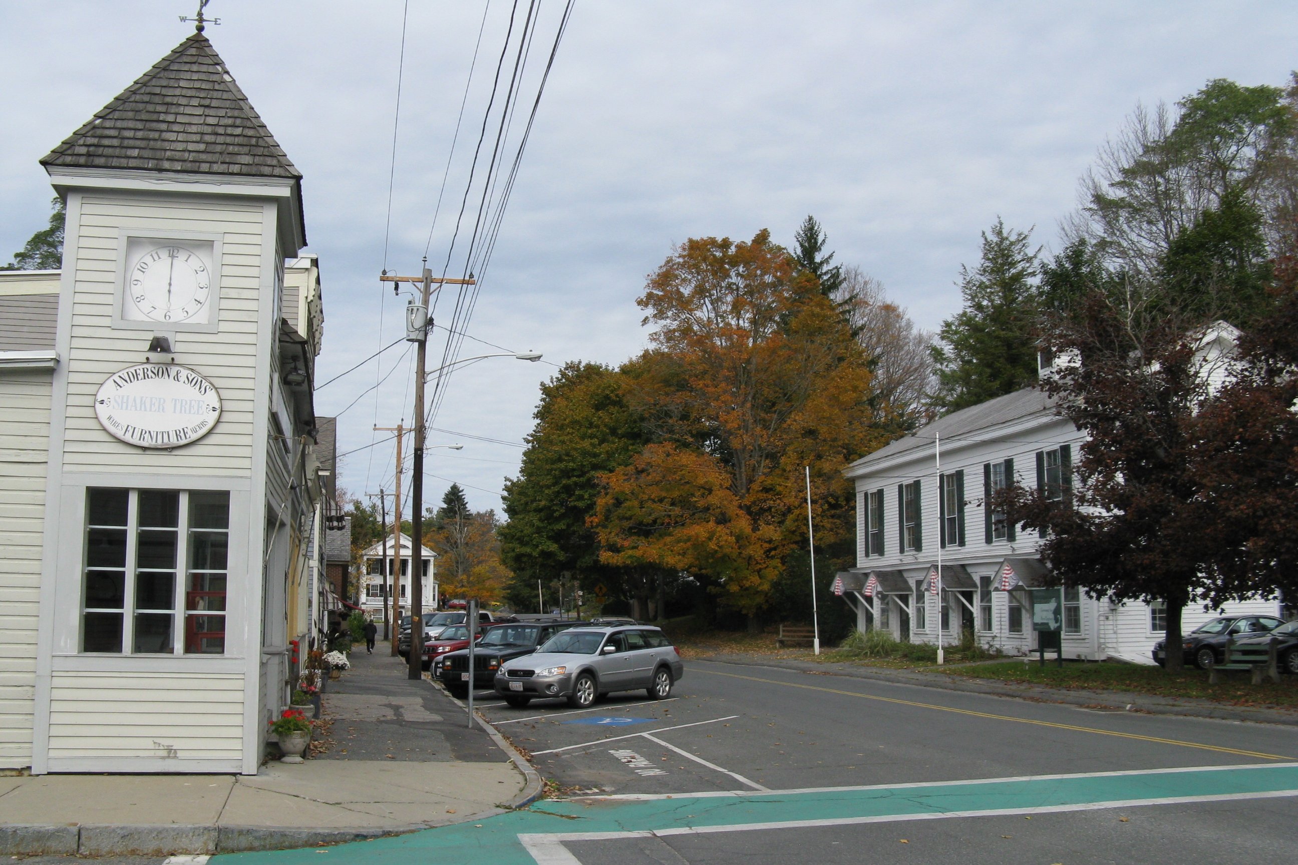 Main Street in West Stockbridge with autumn trees and a clock tower, photographed in 2009